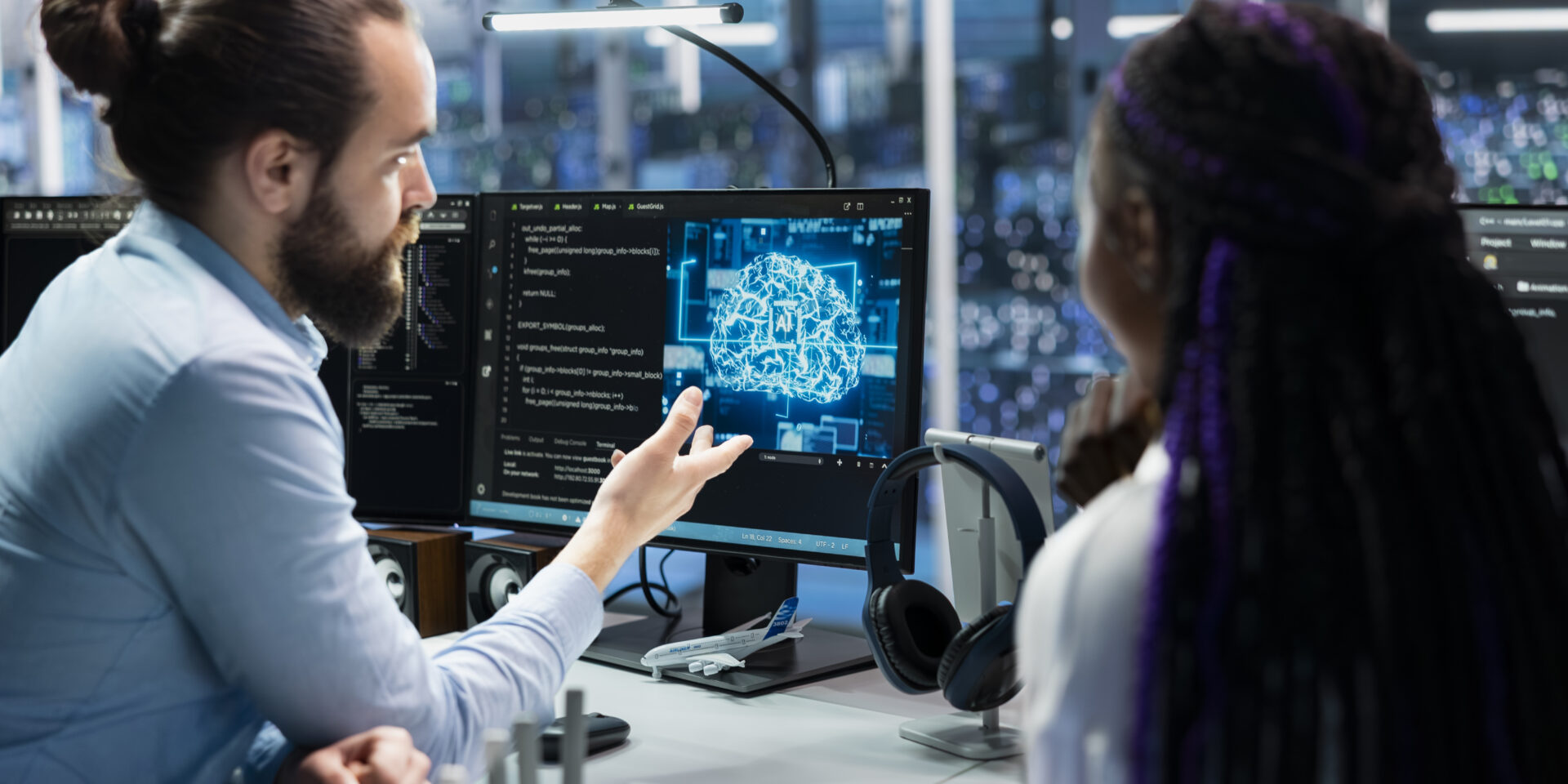 Data center programmers collaborating, working on neural networks AI databases